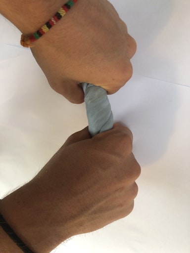 twisting the blu-tack between two hands