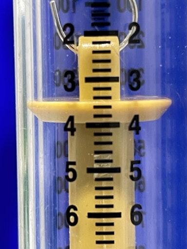 A spring is used in a newton meter. The total length of the spring increases by 2 cm when a force of 4 N acts on it. Which of the following statements is correct? 