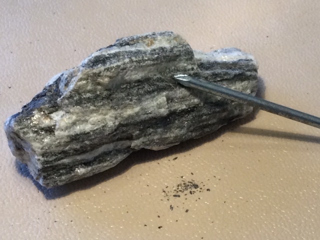 Rocks have different physical properties which we can <span class="blank">______</span> and measure. 